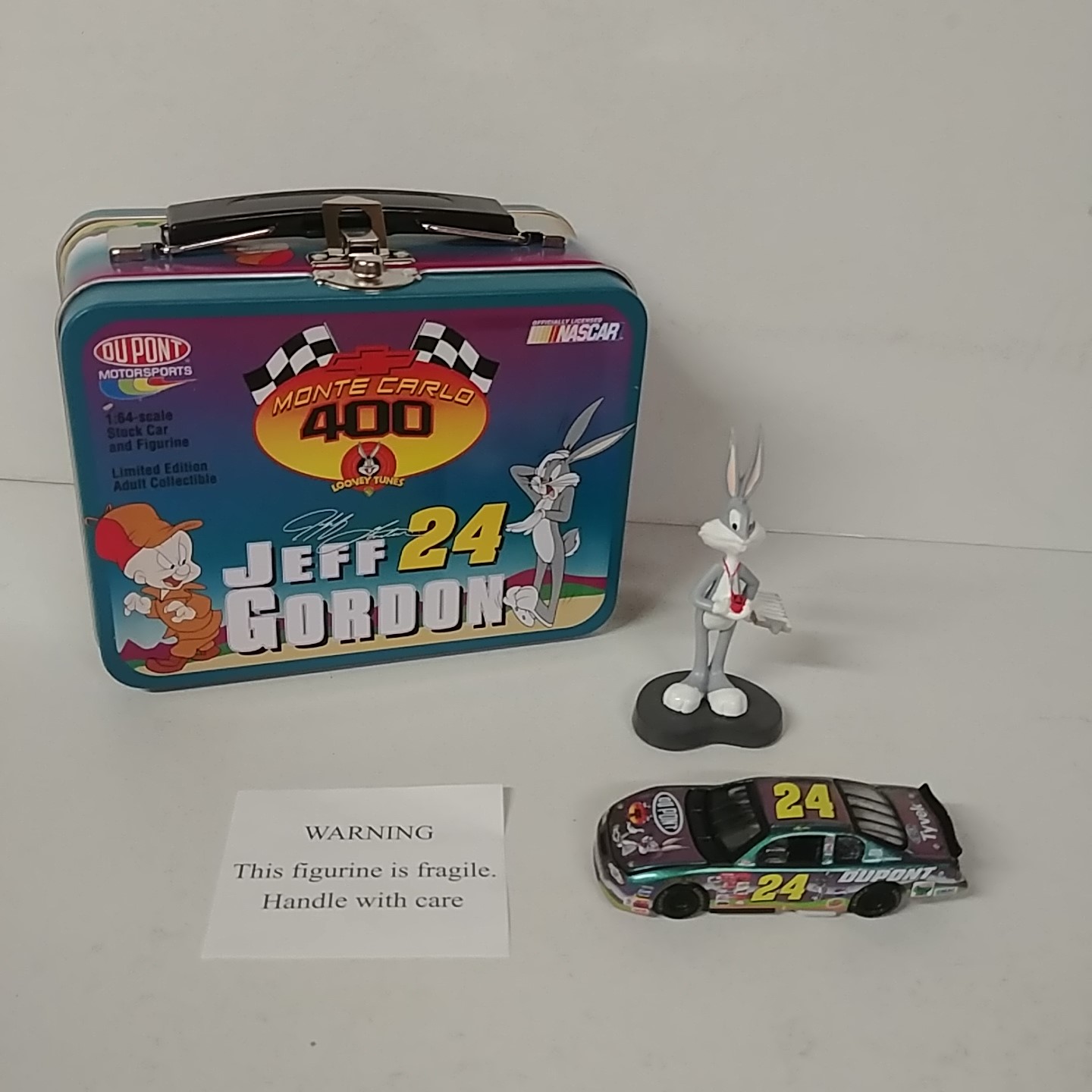 2001 Jeff Gordon 1/64th Dupont "Looney Tunes" RCCA hood open car w/figurine in lunch box