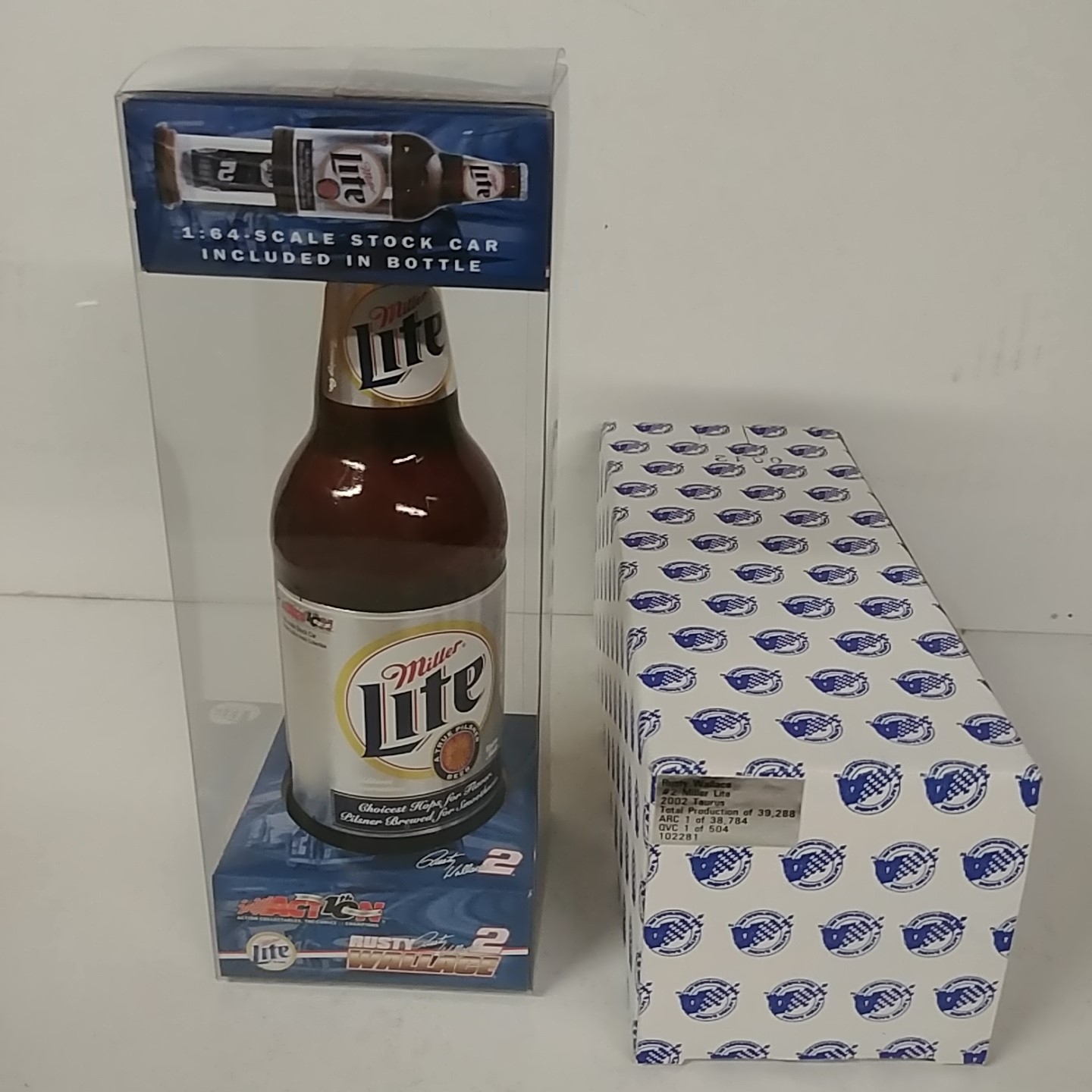 2002 Rusty Wallace 1/64th Miller Lite Taurus car in bottle