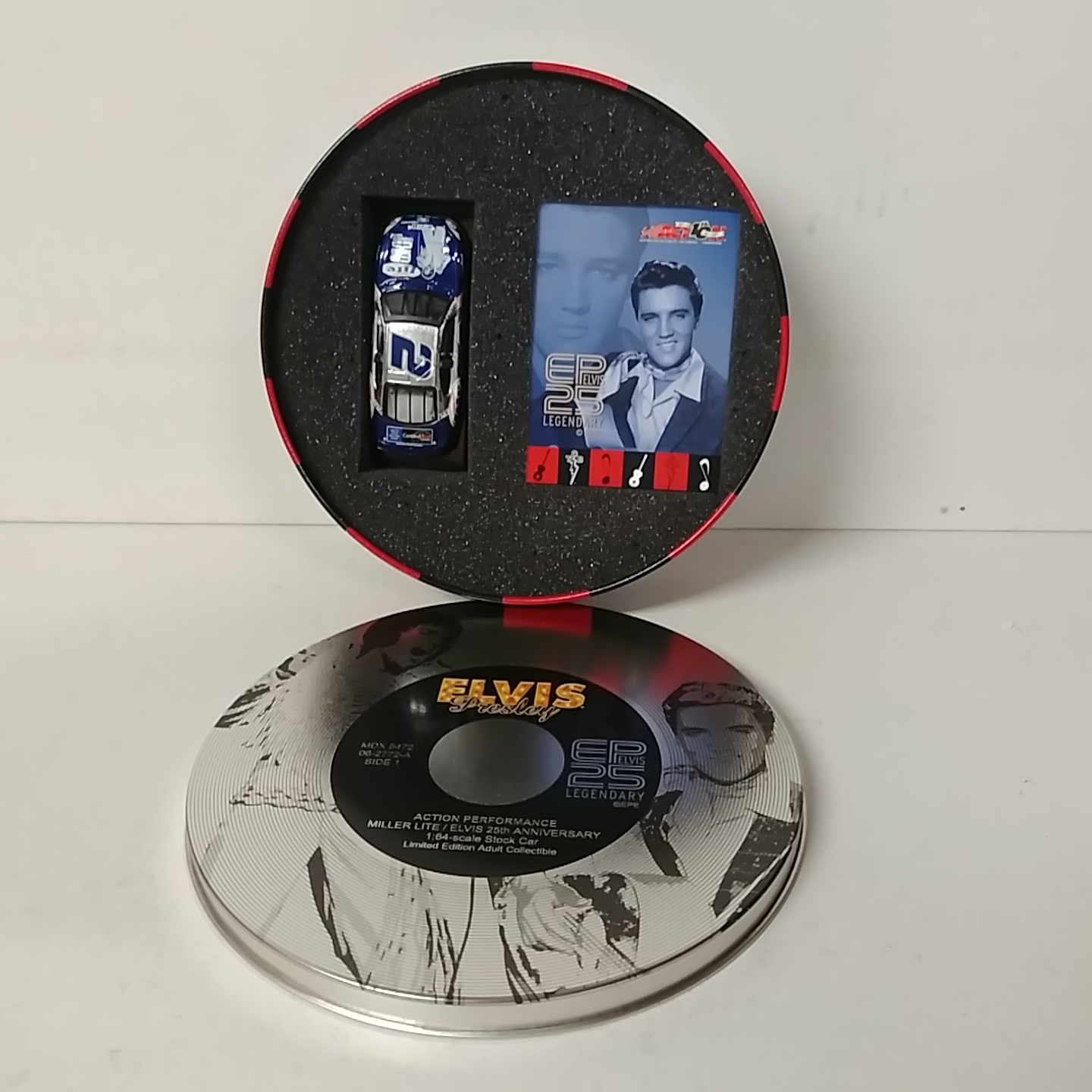 2002 Rusty Wallace 1/64th Miller Lite "Elvis" Taurus in record tin