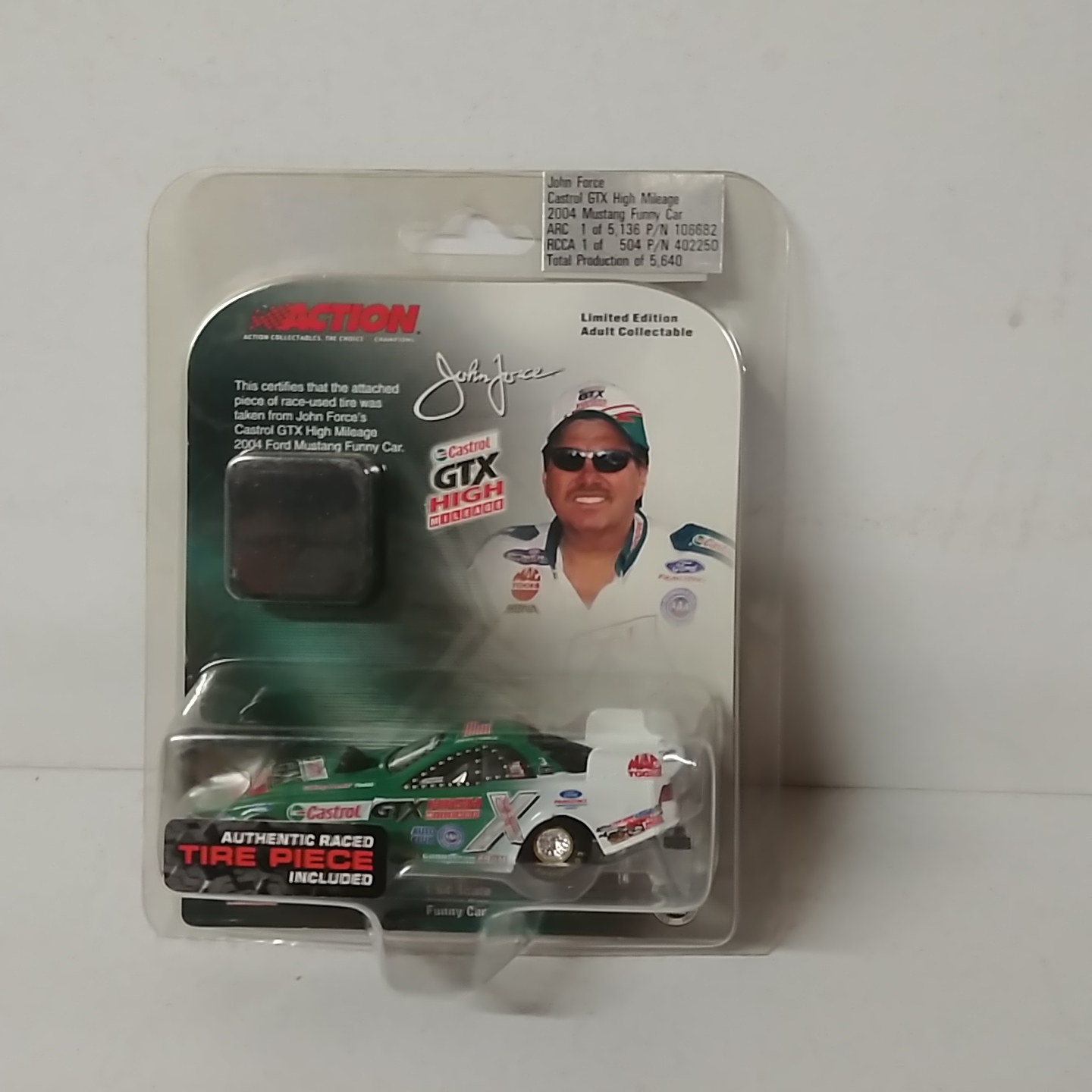 2004 John Force 1/64th Castrol GTX High Milage Mustang Funny car with piece of tire
